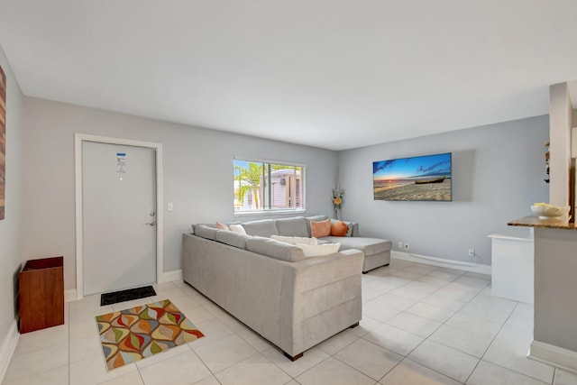 living room featuring light tile patterned flooring