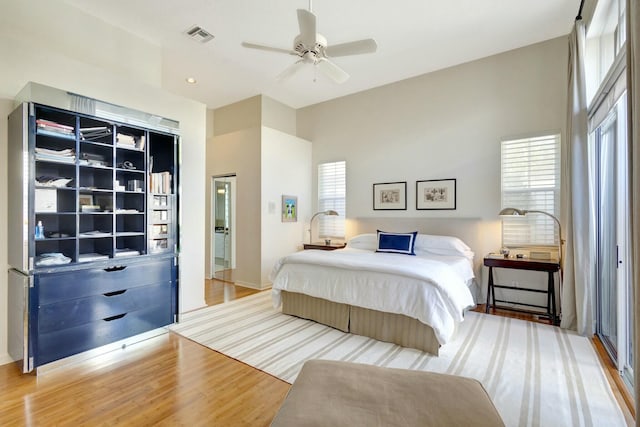 bedroom featuring ceiling fan and wood-type flooring