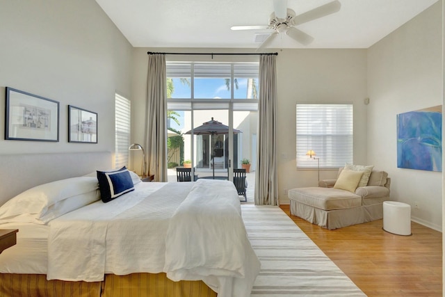 bedroom featuring ceiling fan and light wood-type flooring