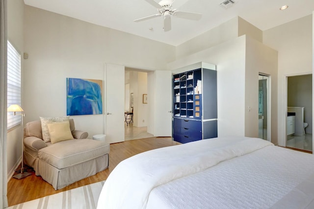 bedroom featuring hardwood / wood-style floors and ceiling fan