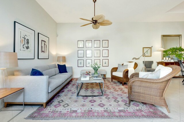 tiled living room featuring ceiling fan