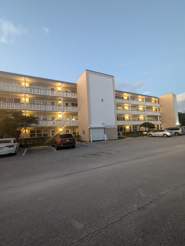 view of outdoor building at dusk