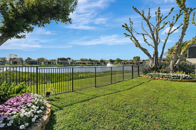 view of yard with a water view