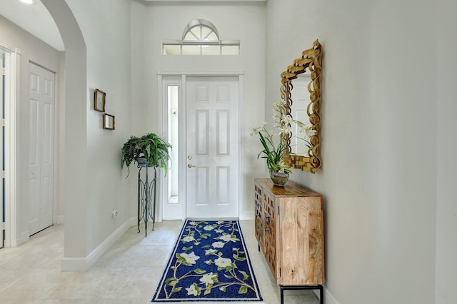 entryway featuring light tile patterned floors