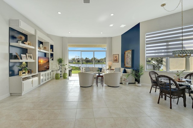 tiled living room featuring built in features