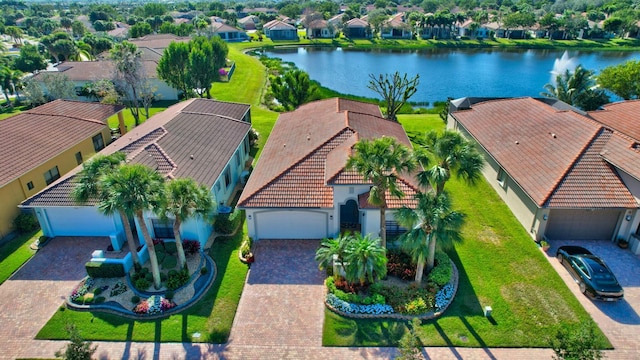 drone / aerial view featuring a water view