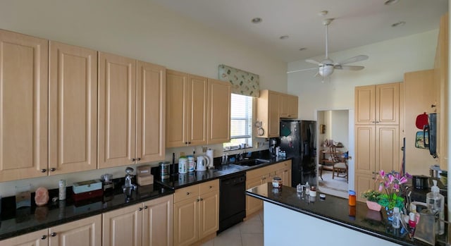 kitchen featuring ceiling fan, black appliances, light tile patterned floors, dark stone countertops, and a high ceiling