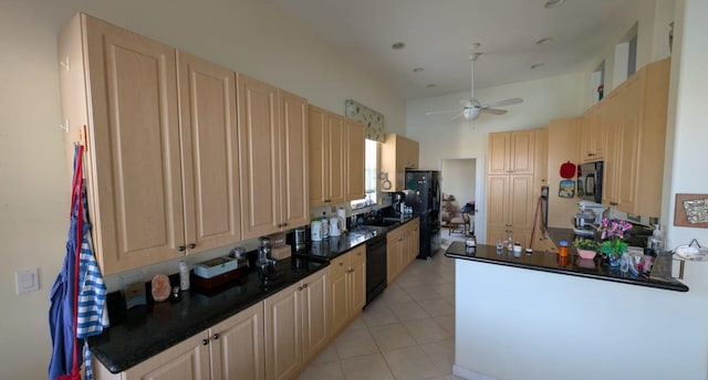 kitchen featuring ceiling fan, a towering ceiling, light brown cabinetry, light tile patterned flooring, and black appliances