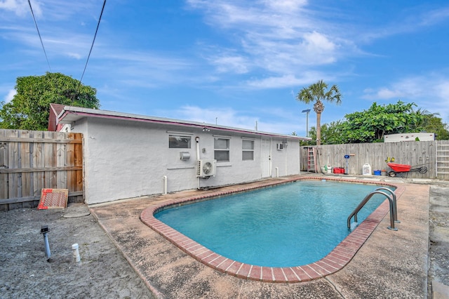 view of pool with a patio area, a fenced backyard, and a fenced in pool