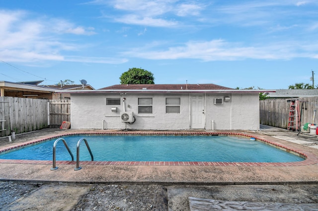 view of swimming pool featuring a fenced backyard and a fenced in pool