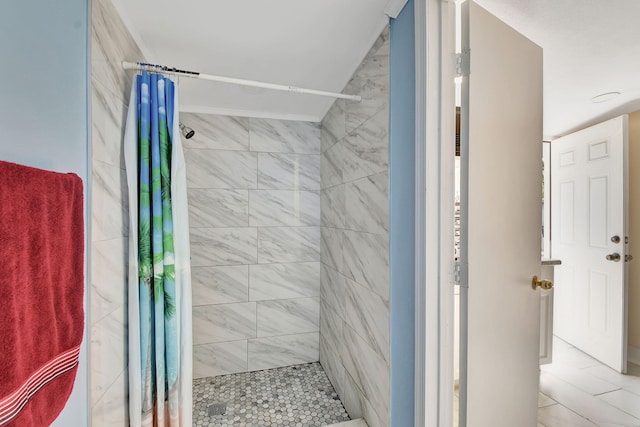 bathroom featuring a stall shower