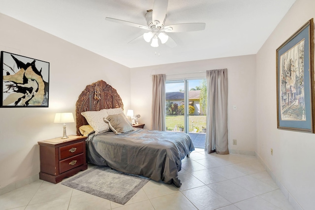 bedroom with access to exterior, light tile patterned floors, and ceiling fan