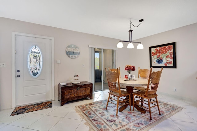 tiled dining space with a wealth of natural light