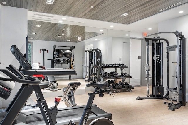 gym with light hardwood / wood-style floors