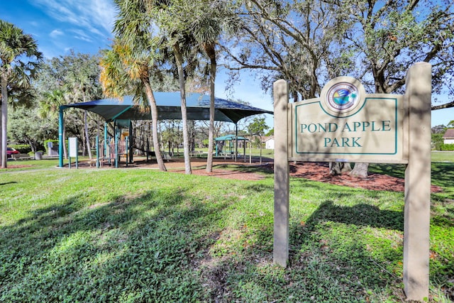 exterior space with a yard and a playground