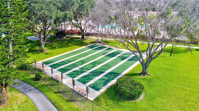 view of community with a lawn