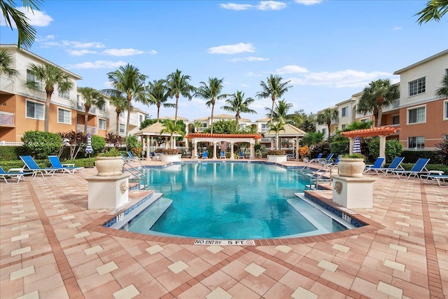 view of swimming pool with a pergola, a patio, and a gazebo