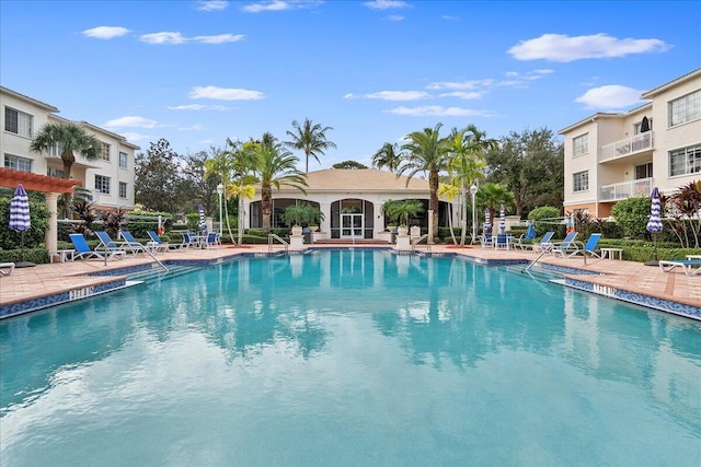 view of swimming pool featuring a patio