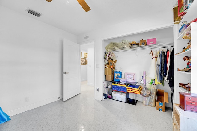 bedroom featuring ceiling fan and a closet