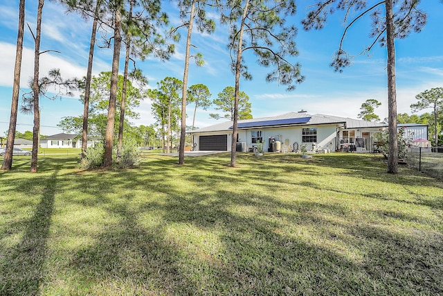 view of yard featuring a garage