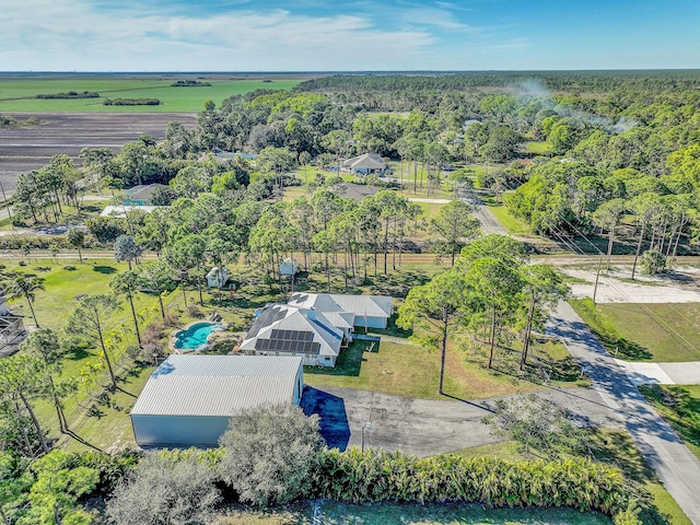 birds eye view of property featuring a rural view