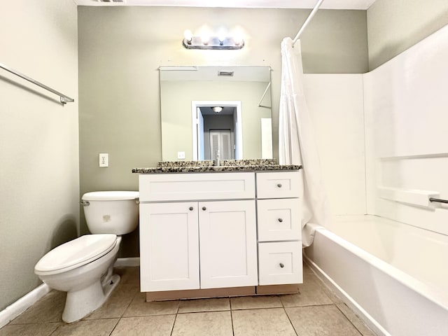 full bathroom featuring tile patterned flooring, vanity, toilet, and shower / bathtub combination with curtain