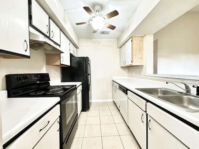 kitchen featuring black appliances, sink, ceiling fan, light tile patterned floors, and white cabinetry