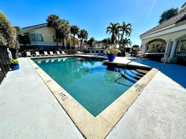 view of pool featuring a patio