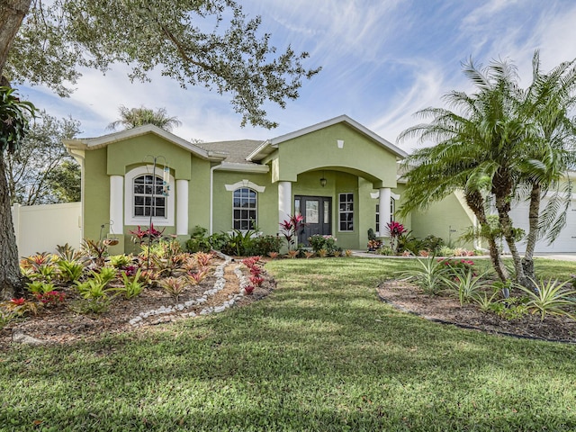 view of front of home with a front lawn