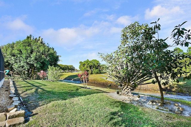 view of yard with a water view