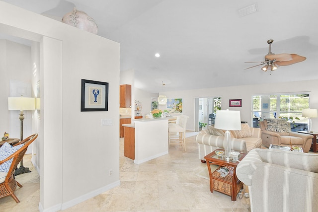 living room featuring ceiling fan