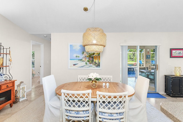 dining room with light tile patterned flooring