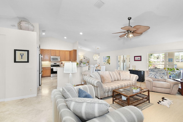 tiled living room with high vaulted ceiling and ceiling fan