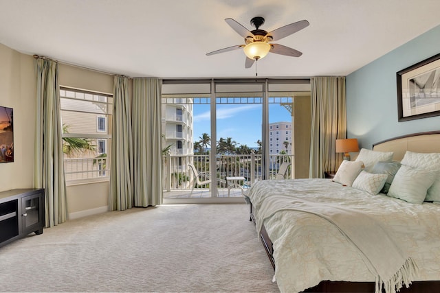 bedroom with carpet, ceiling fan, and access to exterior