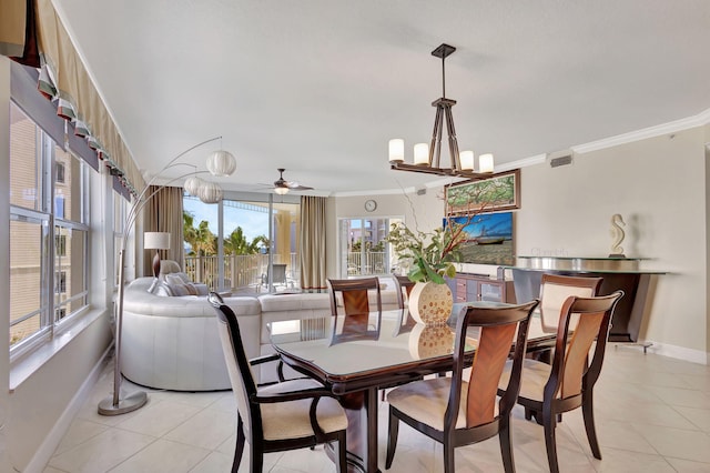 dining space featuring light tile patterned floors, ceiling fan with notable chandelier, and crown molding