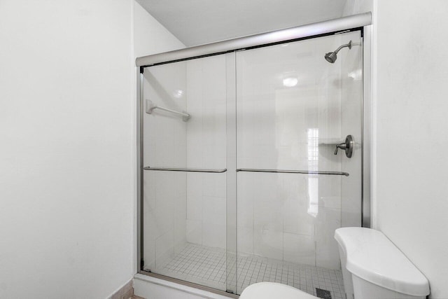 1701 Vision Dr, Palm Beach Gardens, FL 33418 - full bathroom featuring toilet and a shower stall