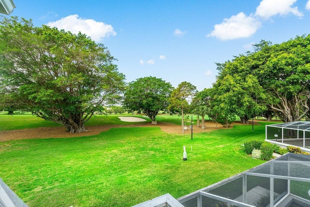 1701 Vision Dr, Palm Beach Gardens, FL 33418 - view of grassy yard featuring a lanai