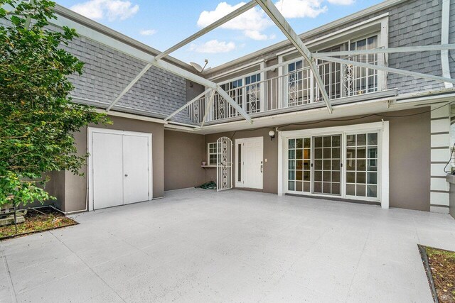 1701 Vision Dr, Palm Beach Gardens, FL 33418 - view of patio featuring a balcony