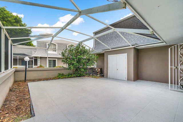 1701 Vision Dr, Palm Beach Gardens, FL 33418 - unfurnished sunroom with lofted ceiling