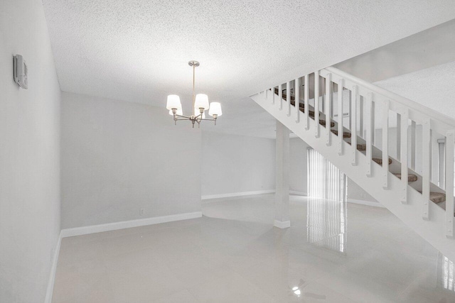 1701 Vision Dr, Palm Beach Gardens, FL 33418 - stairs featuring a textured ceiling, a chandelier, and baseboards