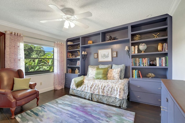 bedroom with ceiling fan, dark wood-type flooring, a textured ceiling, and ornamental molding