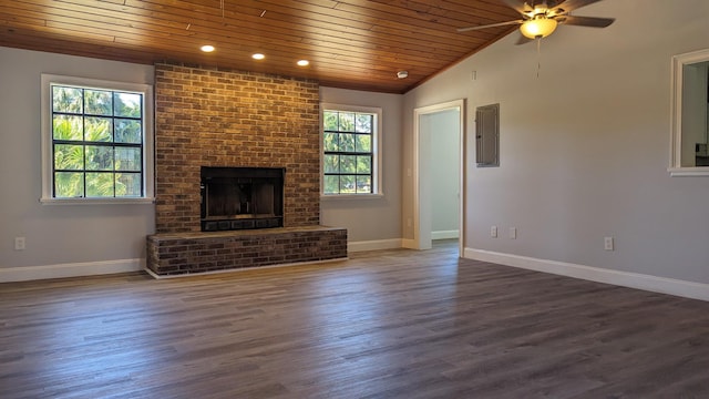 unfurnished living room featuring dark hardwood / wood-style floors, ceiling fan, wood ceiling, and vaulted ceiling