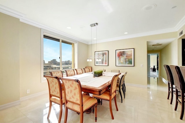 tiled dining room with ornamental molding