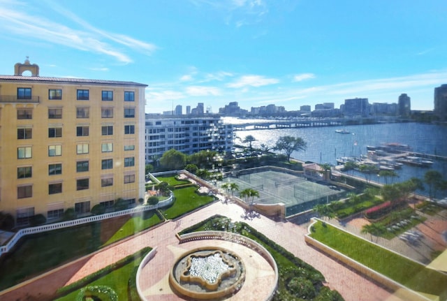 birds eye view of property featuring a water view