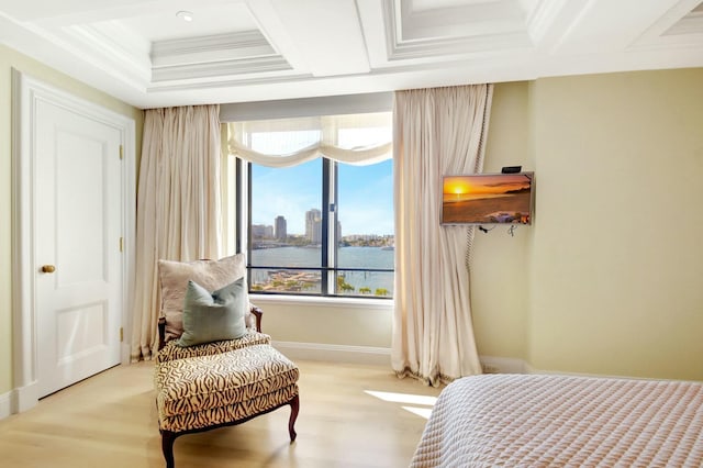 bedroom featuring ornamental molding and coffered ceiling