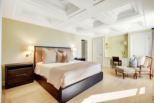 bedroom featuring ornamental molding, light hardwood / wood-style floors, coffered ceiling, and beam ceiling