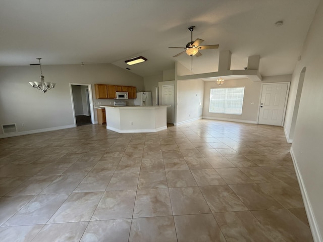 unfurnished living room featuring vaulted ceiling, ceiling fan with notable chandelier, and light tile patterned floors