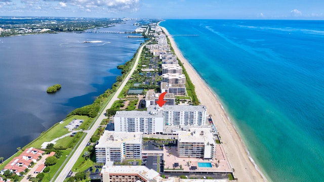 drone / aerial view with a view of the beach and a water view