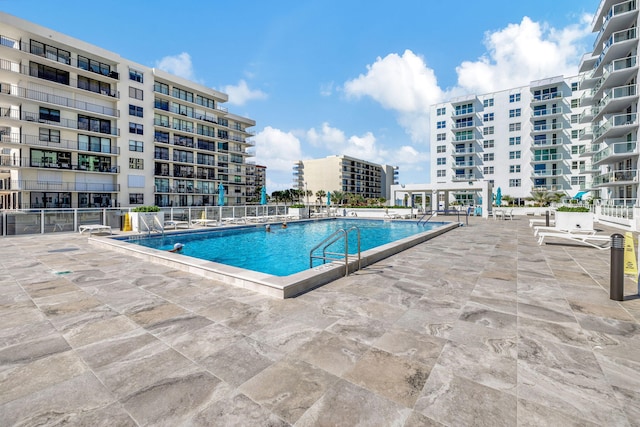 view of pool featuring a patio area