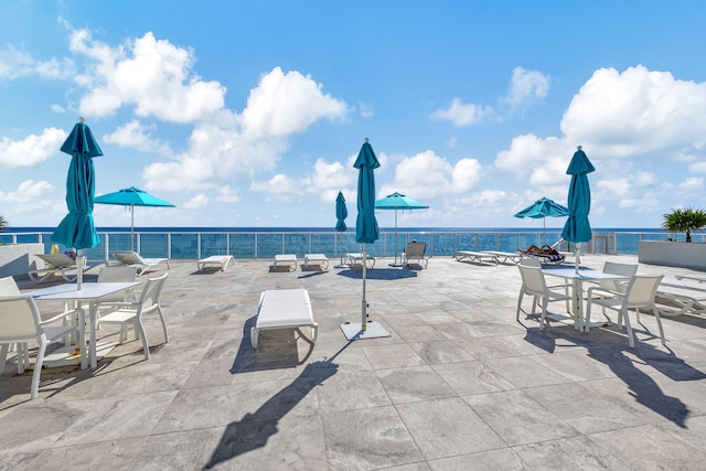 view of patio / terrace with a water view